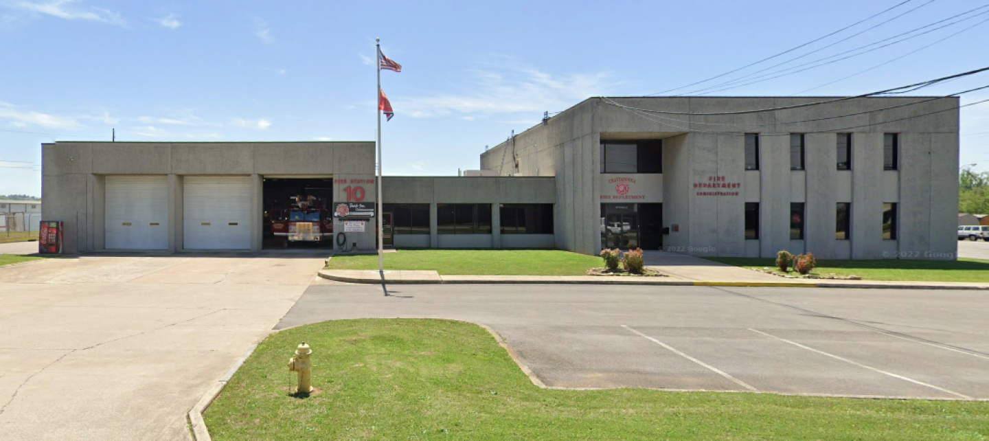 Image of a large building with Fire Station 10 sign attached.