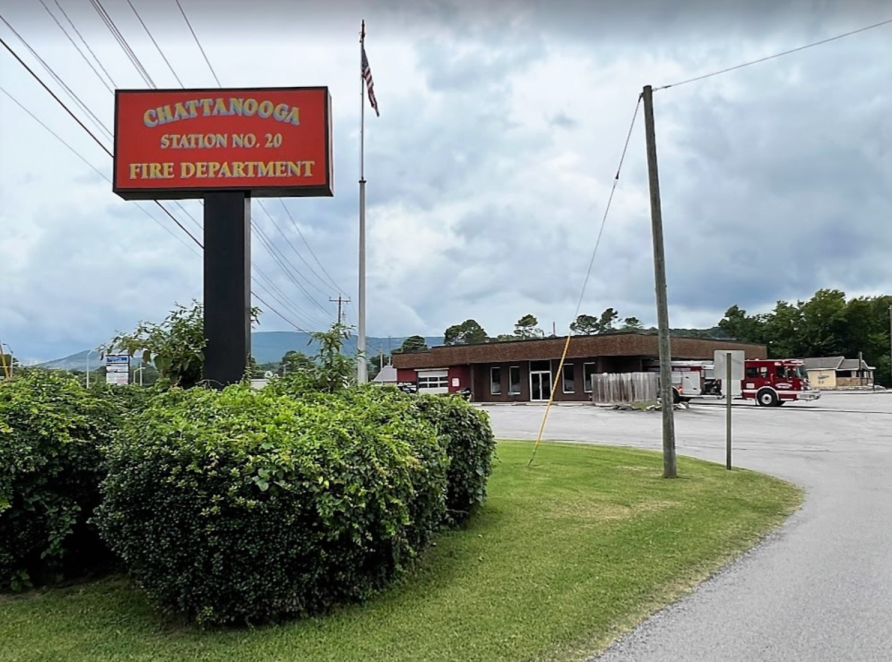 Bush with a tall sign that read "Chattanooga Station number 20, Fire Department "