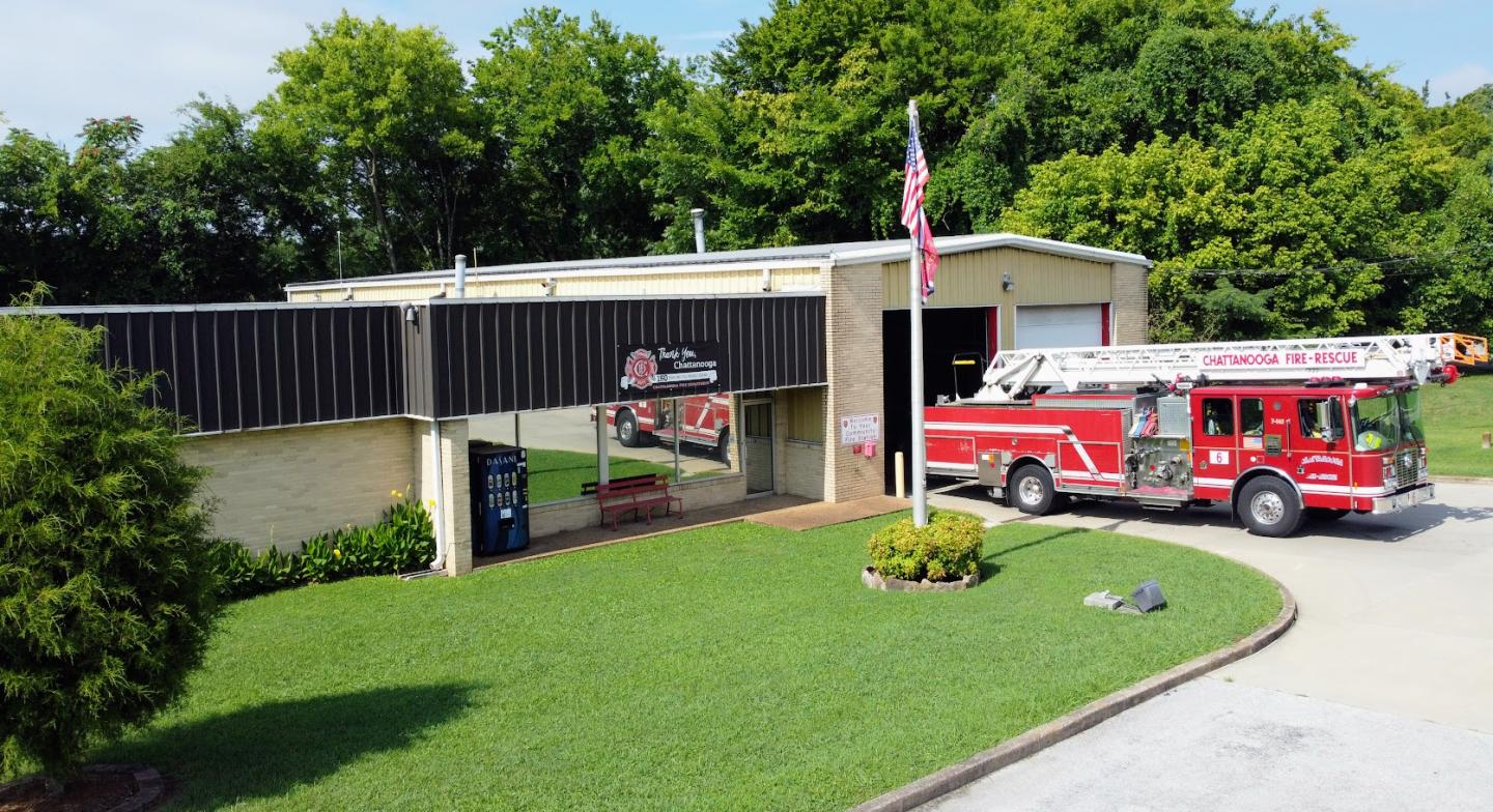 Fire truck parked outside building at fire station 6.