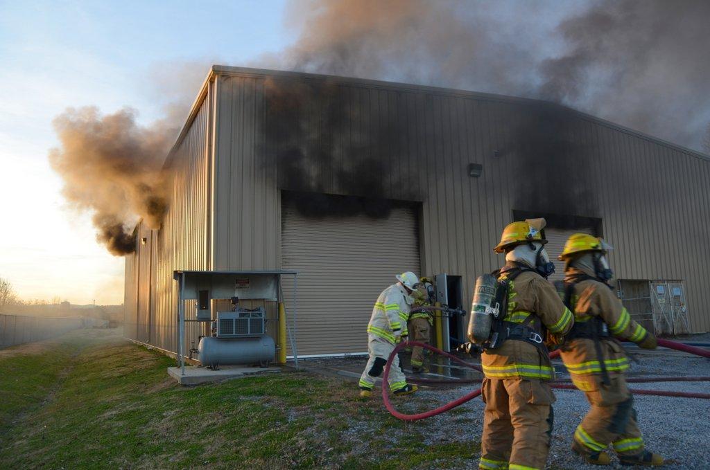 Firefighters Save Commercial Building from Truck Fire