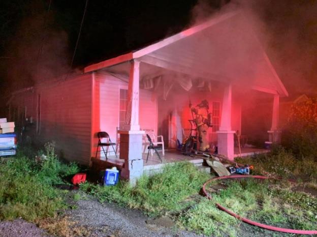 Candles spark E 28th St house fire