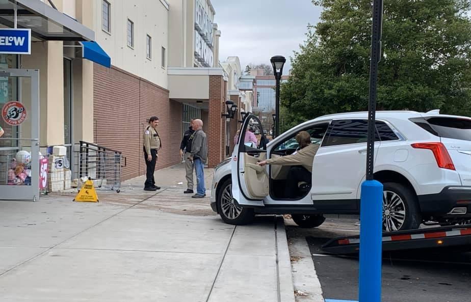 Car strikes store, one sent to hospital