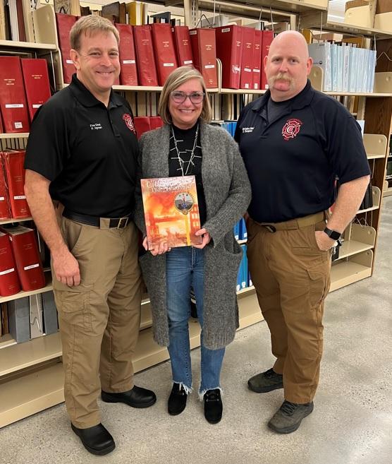 CFD presents Chattanooga Public Library with new history book