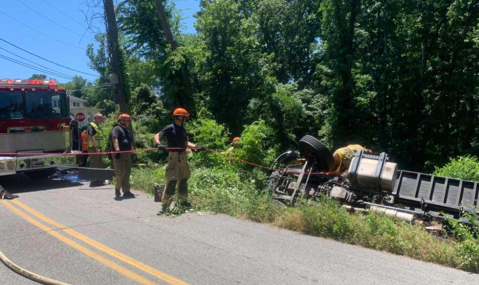 CFD rescues driver of truck hanging off ridge