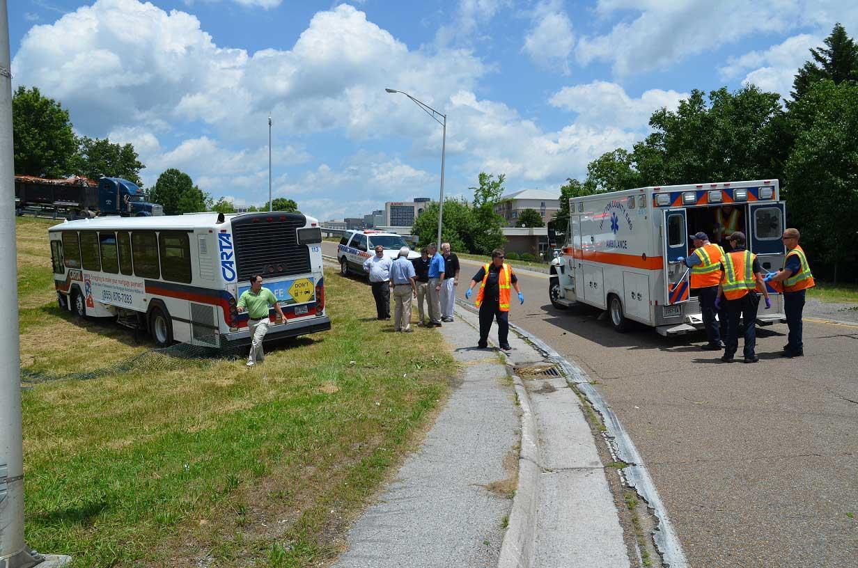 Crash Involving Bus and Car Sends 8 to Hospital