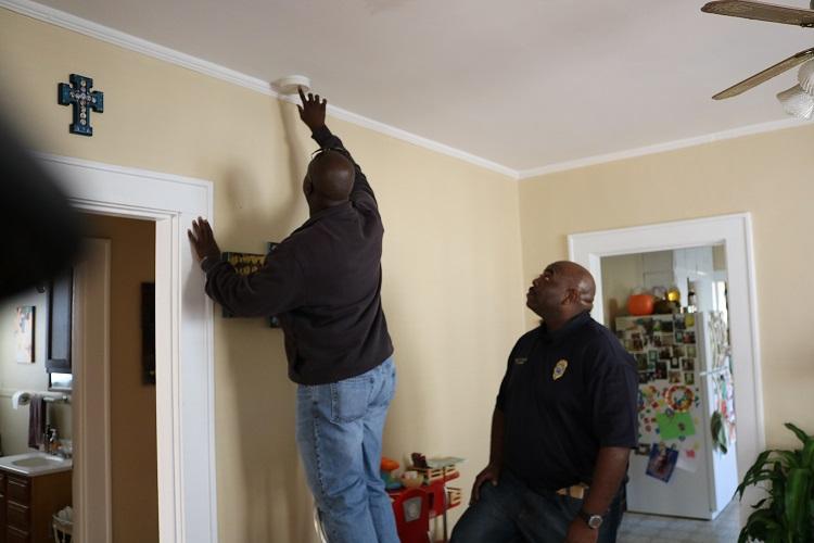 Firefighters and Red Cross Volunteers Install Free Smoke Alarms