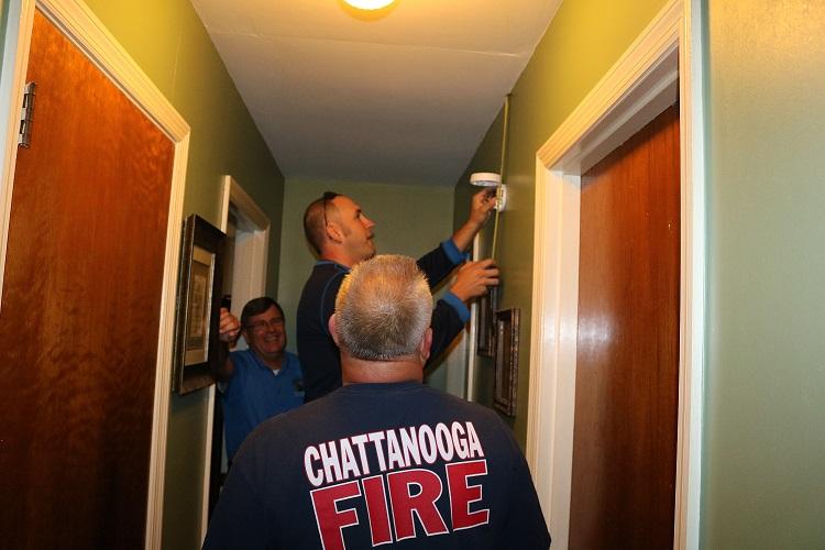 Firefighters and Red Cross Volunteers Install Free Smoke Alarms