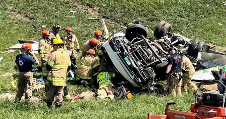 Firefighters free trapped, injured man from wreck