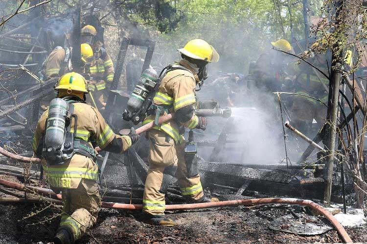 Firefighters Put Out Tent/Shed Fire