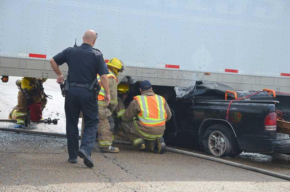 Firefighters Respond to Pickup Under 18-Wheeler