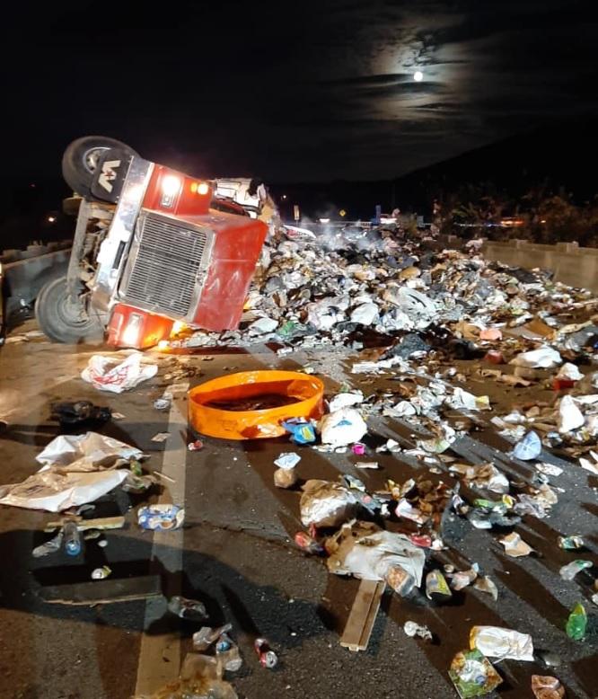 Overturned trash crash