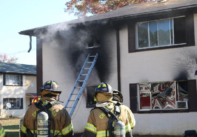 No one injured in apt. fire, dog rescued