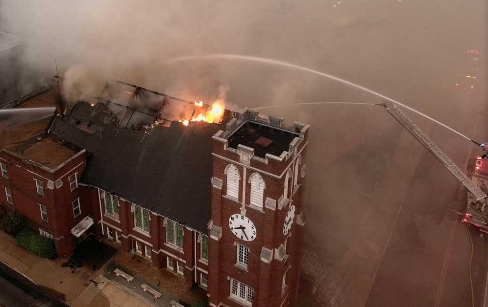 Person of interest sought in massive church fire