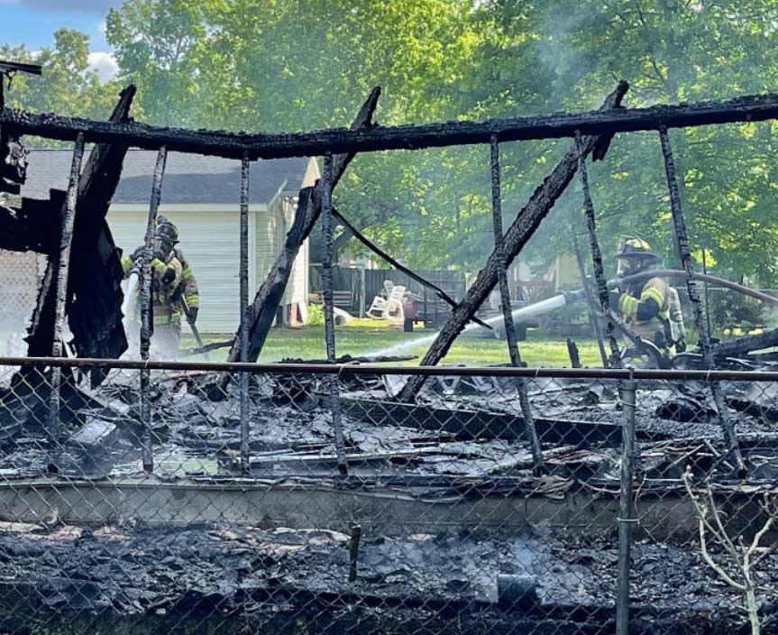 Shed fire spreads on James Ave