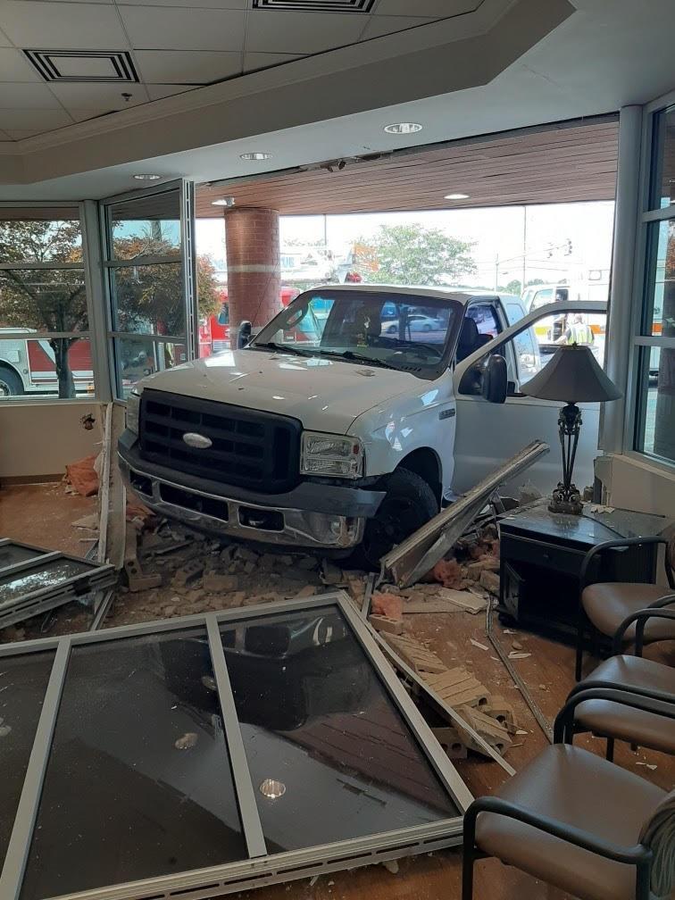 Truck damages front of medical office