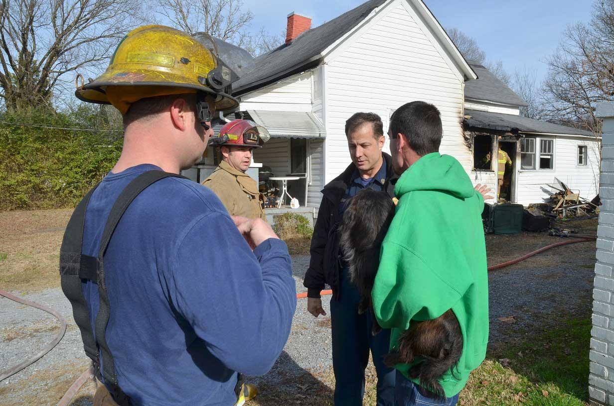 Two of Nine Dogs Perish in House Fire