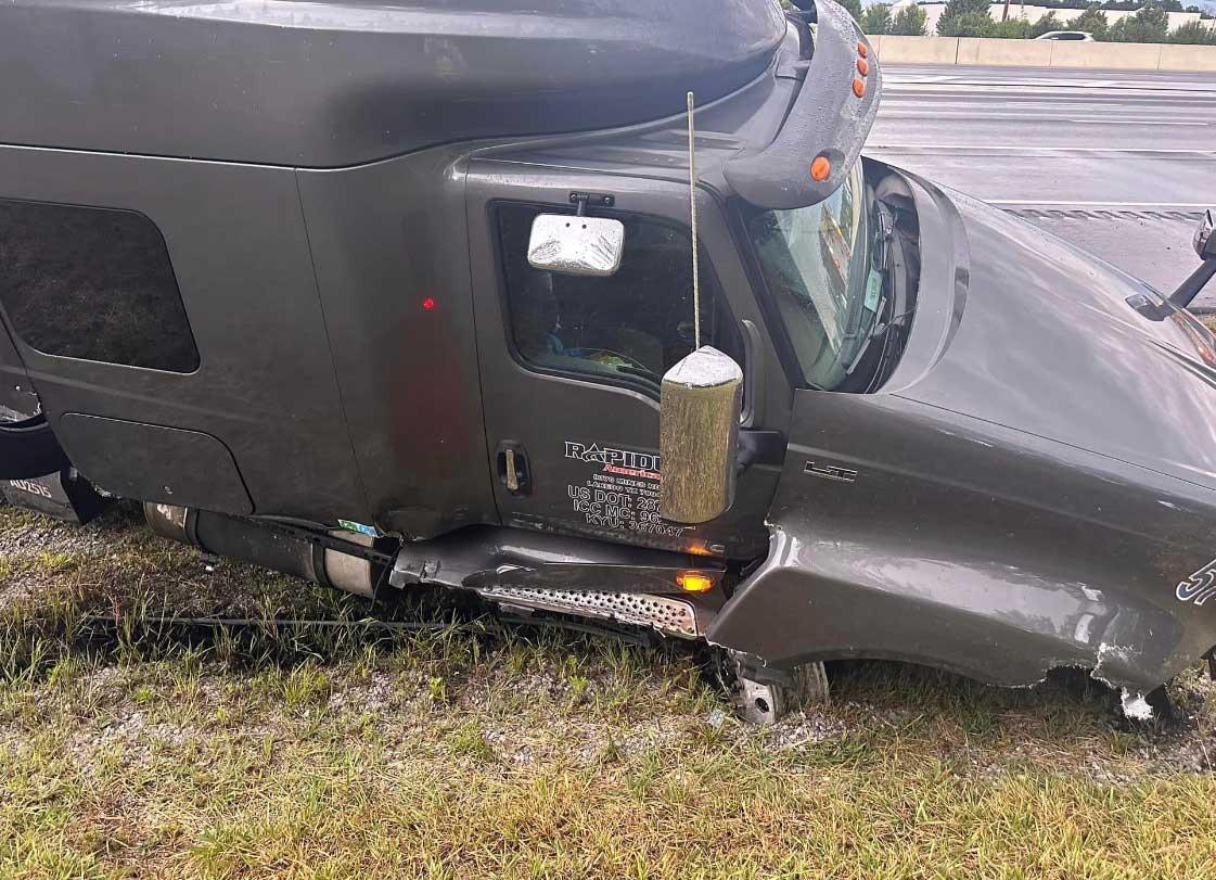 Wet roads lead to semi wrecks