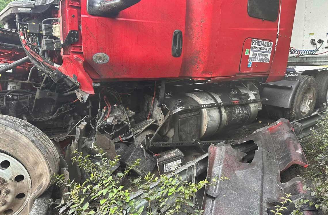 Wet roads lead to semi wrecks